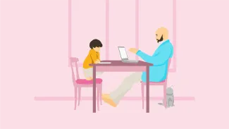 pere et fils et chat dans le salon le père est sur l'ordinateur